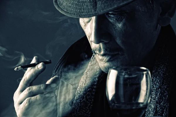 depositphotos 72406577 stock photo contemplation of a crime lord
